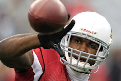 In this Sunday, Jan. 1, 2012, file photo, the Arizona Cardinals' Patrick Peterson warms up prior to a game against the Seattle Seahawks in Glendale, Ariz.
