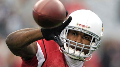In this Sunday, Jan. 1, 2012, file photo, the Arizona Cardinals' Patrick Peterson warms up prior to a game against the Seattle Seahawks in Glendale, Ariz.