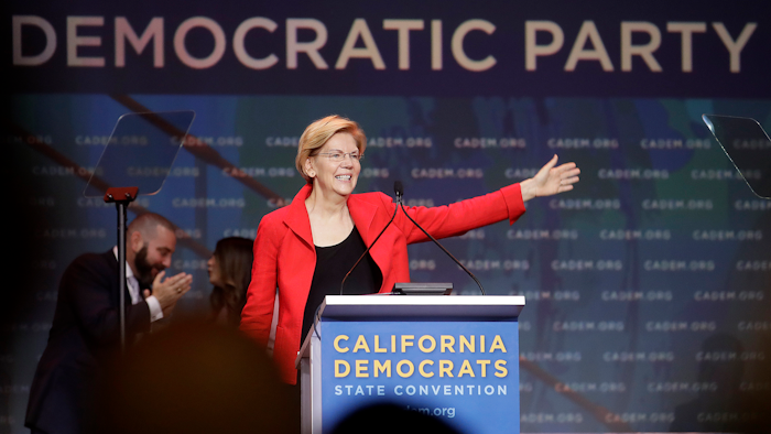 Sen. Elizabeth Warren, D-Mass., waves before speaking during the 2019 California Democratic Party State Organizing Convention in San Francisco, Saturday, June 1, 2019.
