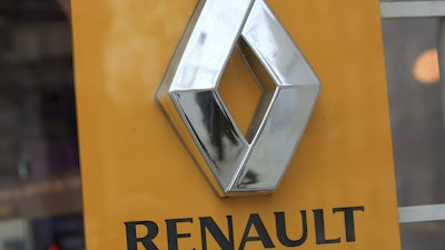 In this Jan. 19, 2016, file photo, the Renault logo is pictured on a Renault showroom in Paris.