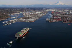 In this March 5, 2019, file photo, a cargo ship arrives at the Port of Tacoma, in Tacoma, Wash.