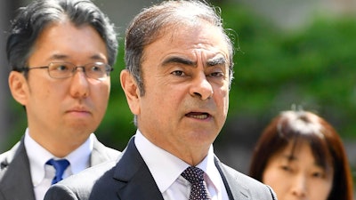 Former Nissan chairman Carlos Ghosn arrives at Tokyo District Court for a pre-trial meeting, Thursday, May 23, 2019.