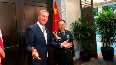 Acting U.S. Secretary of Defense Patrick Shanahan meets with China's Minister of National Defense Wei Fenghe during a meeting on the sidelines of the 18th International Institute for Strategic Studies (IISS) Shangri-la Dialogue in Singapore, Friday, May 31, 2019.