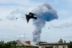 Smoke rises after an explosion in a plant manufacturing TNT explosive in Dzerzhinsk, Russia, Saturday, June 1, 2019.