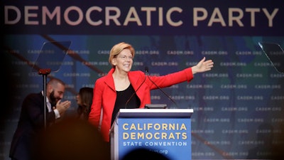 Sen. Elizabeth Warren, D-Mass., waves before speaking during the 2019 California Democratic Party State Organizing Convention in San Francisco, Saturday, June 1, 2019.