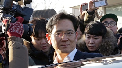 In this Feb. 5, 2018, file photo, Lee Jae-yong, vice chairman of Samsung Electronics, gets into a car in Uiwang, South Korea.