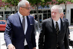 Carnival Corp. President Arnold Donald, left, arrives at federal court, Monday, June 3, 2019, in Miami.