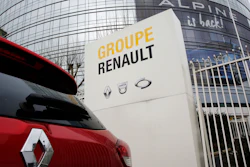 This photo, taken Thursday, Jan. 24, 2019, shows a Renault car outside the French carmaker's headquarters in Boulogne-Billancourt.