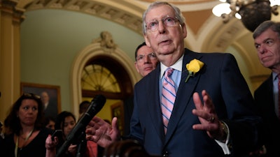 Senate Majority Leader Mitch McConnell speaks to reporters following the weekly policy lunches on Capitol Hill, Tuesday, June 4, 2019.