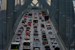In this Dec. 10, 2015, file photo, vehicles make their way westbound across Bay Bridge in San Francisco.