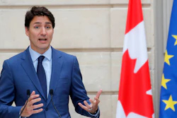 Canadian Prime Minister Justin Trudeau speaks during a press conference at the Elysee Palace in Paris, Friday, June 7, 2019.