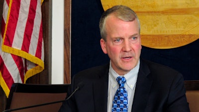 In this Feb. 21, 2019, file photo, U.S. Sen. Dan Sullivan speaks to reporters after giving his annual address to a joint session of the Alaska Legislature in Juneau.