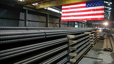 In this May 9, 2019, photo, steel rods produced at the Gerdau Ameristeel mill in St. Paul, Minn., await shipment.