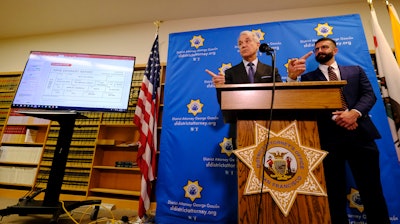 San Francisco District Attorney George Gascon, left, announces the implementation of an artificial intelligence tool to remove potential for bias in charging decisions, Wednesday, June 12, 2019.