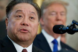 In this Nov. 2, 2017, file photo, Broadcom CEO Hock Tan speaks at an event in the White House.