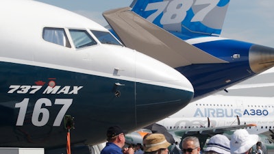 In this June 20, 2017, file photo, Boeing planes are displayed at the Paris Air Show in Le Bourget, France.