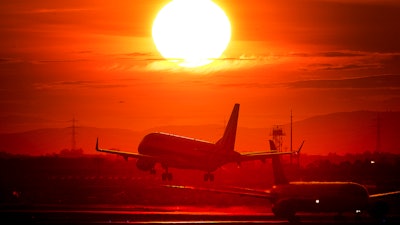 In this Wednesday, March 20, 2019, file photo, an aircraft lands at the international airport in Frankfurt.