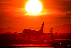 In this Wednesday, March 20, 2019, file photo, an aircraft lands at the international airport in Frankfurt, Germany.