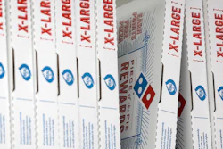 This Oct. 27, 2016, photo shows Domino's Pizza boxes at a location in Hialeah, Fla.