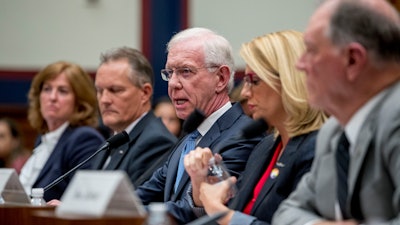 Captain Chesley Sullenberger, accompanied by, from left, Sharon Pinkerton with Airlines for America, Captain Dan Carey with the Allied Pilots Association, Sara Nelson with the Association of Flight Attendants-CWA, and former FAA Administrator Randy Babbitt, speaks during a hearing on Capitol Hill, Wednesday, June 19, 2019.