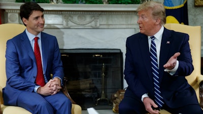 President Donald Trump meets with Canadian Prime Minister Justin Trudeau in the Oval Office of the White House, Thursday, June 20, 2019.