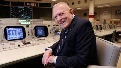 Gene Kranz, aerospace engineer, fighter pilot, an Apollo-era flight director and later director of NASA flight operations, sits at the console where he worked during the Gemini and Apollo missions at the NASA Johnson Space Center Monday, June 17, 2019, in Houston. 'The impact is incredible,' Kranz, 85, said. With all the vacated seats, the room reminded him of a shift change when flight controllers would hit the restroom. 'So this room is now empty and it's soon going to be filled and all of a sudden, the energy that this room possesses is going to start enveloping the environment here.'