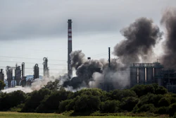 A plume of smoke rises during a fire at the Indorama Ventures petrochemical plant in San Roque, Spain, Tuesday, June 25, 2019.
