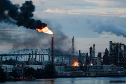In this June 21, 2019, file photo, flames and smoke emerge from the Philadelphia Energy Solutions Refining Complex in Philadelphia.