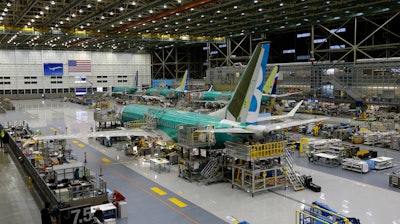 This Dec. 7, 2015, file photo shows a Boeing 737 Max airplane being built on the assembly line in Renton, Wash.