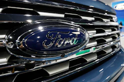 In this Thursday, March 28, 2019, file photo, the Ford logo is shown at an auto show in Denver.