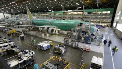 Boeing 737-800 airplanes sit on the assembly line at Boeing's 737 assembly facility in Renton, Wash.