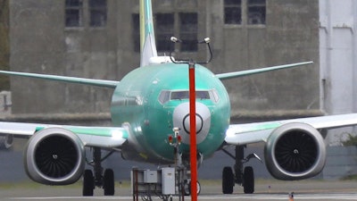 A Boeing 737 MAX 8 airplane turns before taking off on a test flight, Wednesday, April 10, 2019, at Boeing Field in Seattle.