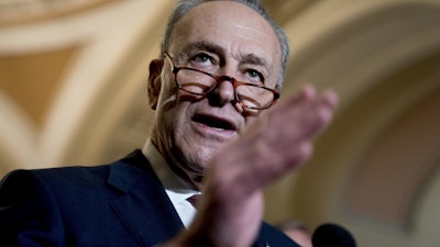 Senate Minority Leader Chuck Schumer , D-N.Y., speaks to reporters following a Senate policy luncheon on Capitol Hill, Tuesday, Jan. 23, 2018.