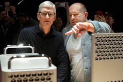 In this Monday, June 3, 2019 file photo, Apple CEO Tim Cook, left, and chief design officer Jonathan Ive look at the Mac Pro in the display room at the Apple Worldwide Developers Conference in San Jose, Calif. On Thursday, June 27, 2019, Apple said that Ive, chief design officer, will be leaving after more than two decades at the company to start his own firm.