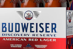 This image provided by Budweiser in June 2019 shows packaging for their Discovery Reserve beer. It revives a recipe from the 1960s and features 11 symbolic stars around their logo, in honor of the 50th anniversary of the Apollo 11 moon landing.