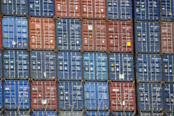 In this June 19, 2019, file photo cargo containers are stacked on a ship at the Port of Los Angeles in Los Angeles. Manufacturers see the Trump administration’s trade policies as a bigger challenge than the economy. That’s one of the findings of a quarterly survey by the National Association of Manufacturers, or NAM, released last week.