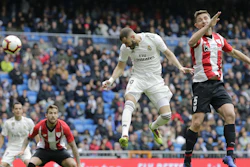 Real Madrid’s Karim Benzema heads for the ball to score during a Spanish La Liga soccer match between Real Madrid and Athletic Bilbao in Madrid, Sunday, April 21, 2019.