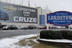 In this Nov. 27, 2018, file photo, a banner depicting the Chevrolet Cruze model vehicle displayed at the General Motors plant in Lordstown, Ohio.