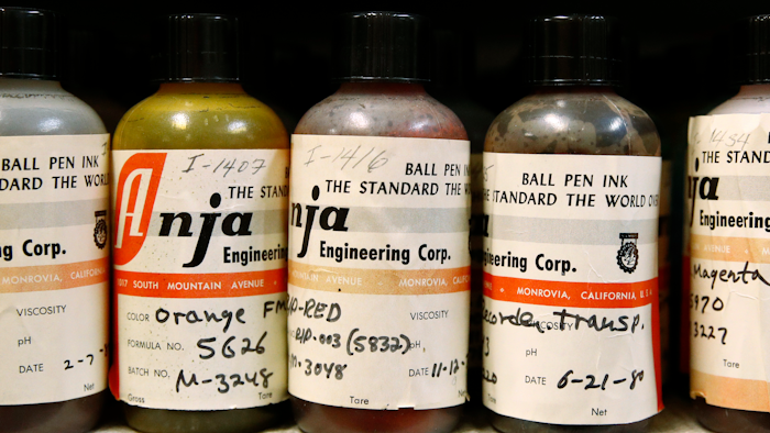 In this June 27, 2019 photo, ink samples collected by former U.S. Secret Service chief chemist Antonio Cantu sit on a shelve in a newly-dedicated International Ink Library in remembrance of Cantu at the Secret Service headquarters building in Washington. The library contains more than 15,000 samples of pen, marker and printer inks dating back to the 1920s.