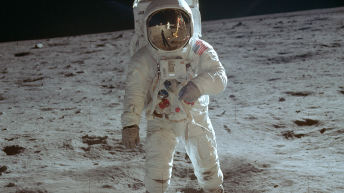 In this July 20, 1969 photo made available by NASA, astronaut Buzz Aldrin, lunar module pilot, walks on the surface of the moon during the Apollo 11 extravehicular activity.