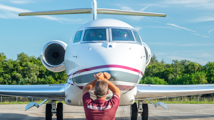 This Thursday, July 11, 2019, photo, provided by Chris Garrison, shows a Gulfstream aircraft on the tarmac after its record-breaking around-the-world flight.
