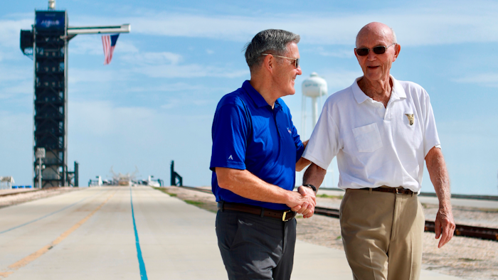 In this Tuesday, July 16, 2019, photo, astronaut Michael Collins, right, speaks to Kennedy Space Center Director Bob Cabana at Launch Complex 39A.