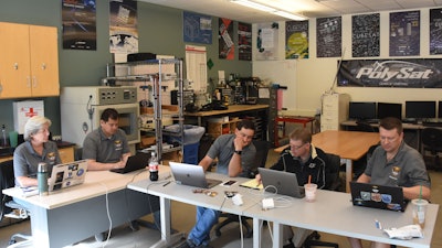 The Planetary Society's LightSail 2 team prior to sail deployment, July 23, 2019, at the Cal Poly CubeSat lab in San Luis Obispo, Calif.