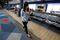 Chieko Asakawa uses an airport wayfinding app to navigate through Pittsburgh International Airside terminal, June 9, 2019.