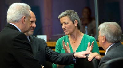 European Commissioner for Competition Margrethe Vestager, center, at EU headquarters in Brussels, Wednesday, July 3, 2019.