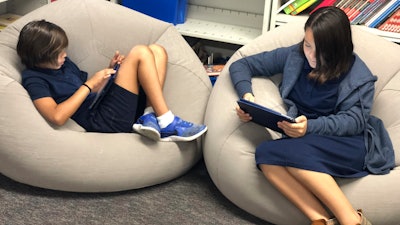 Students use bean bags in a classroom at Feaster Charter School in Chula Vista, Calif.