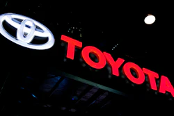 In this Feb. 7, 2018, file photo, the Toyota logo is displayed at the Auto Expo in Greater Noida, India.