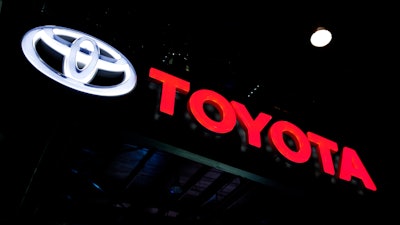 In this Feb. 7, 2018, file photo, the Toyota logo is displayed at the Auto Expo in Greater Noida, India.