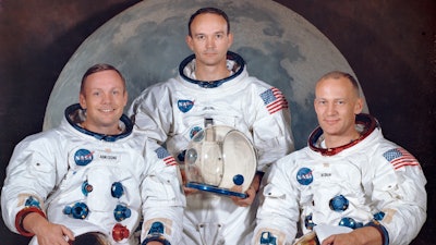 This March 30, 1969, photo made available by NASA shows the crew of the Apollo 11, from left, Neil Armstrong, commander; Michael Collins, module pilot; Edwin E. 'Buzz' Aldrin, lunar module pilot.