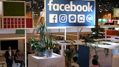 In this June 16, 2017, file photo, the Facebook booth is seen at the Vivatech, a gadgets show in Paris.